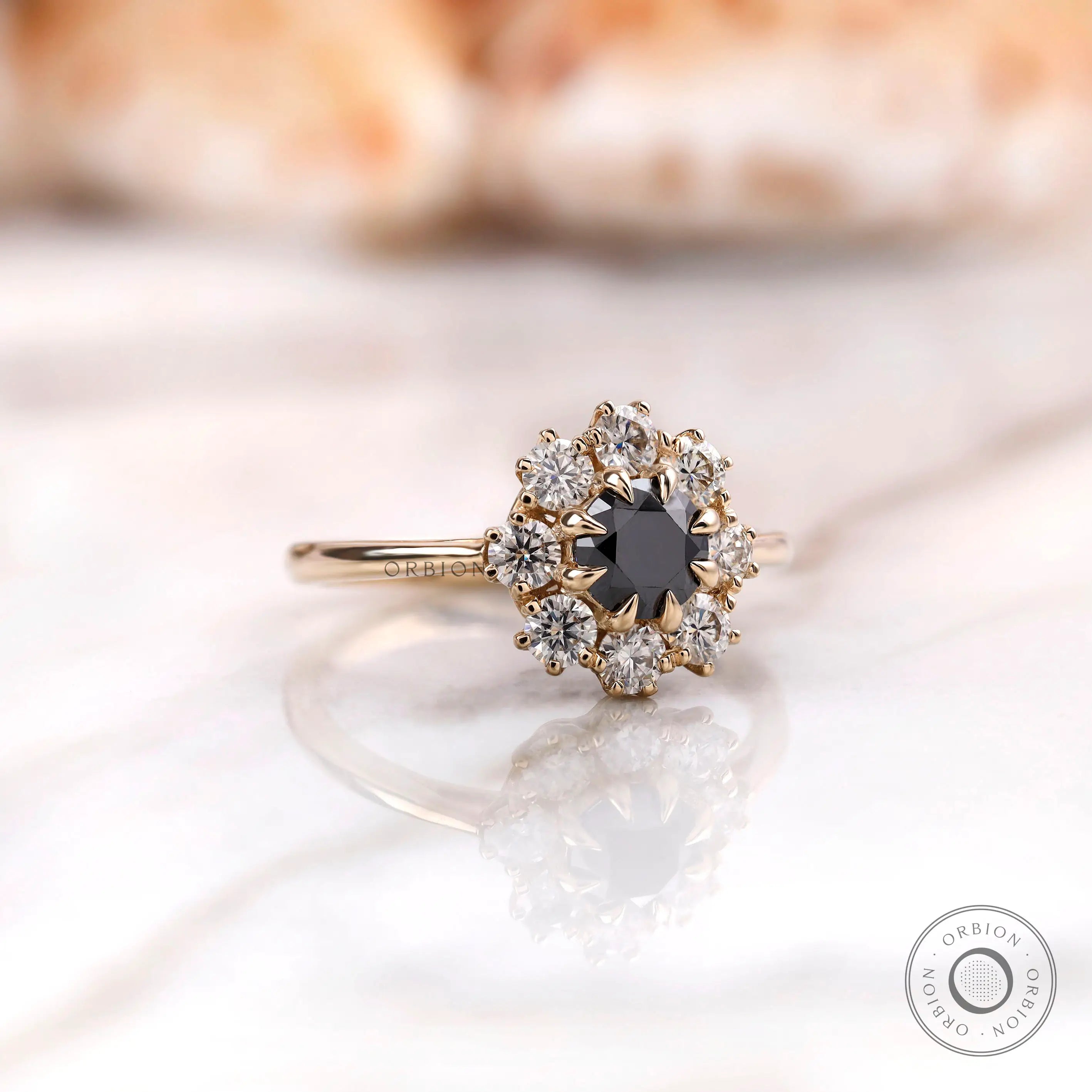 Angled front view black Old European cut halo ring