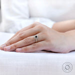 Top view on hand black moissanite halo cluster ring