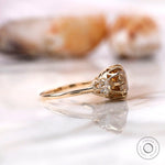 Antique inspired three stone moissanite ring with crown prong setting
