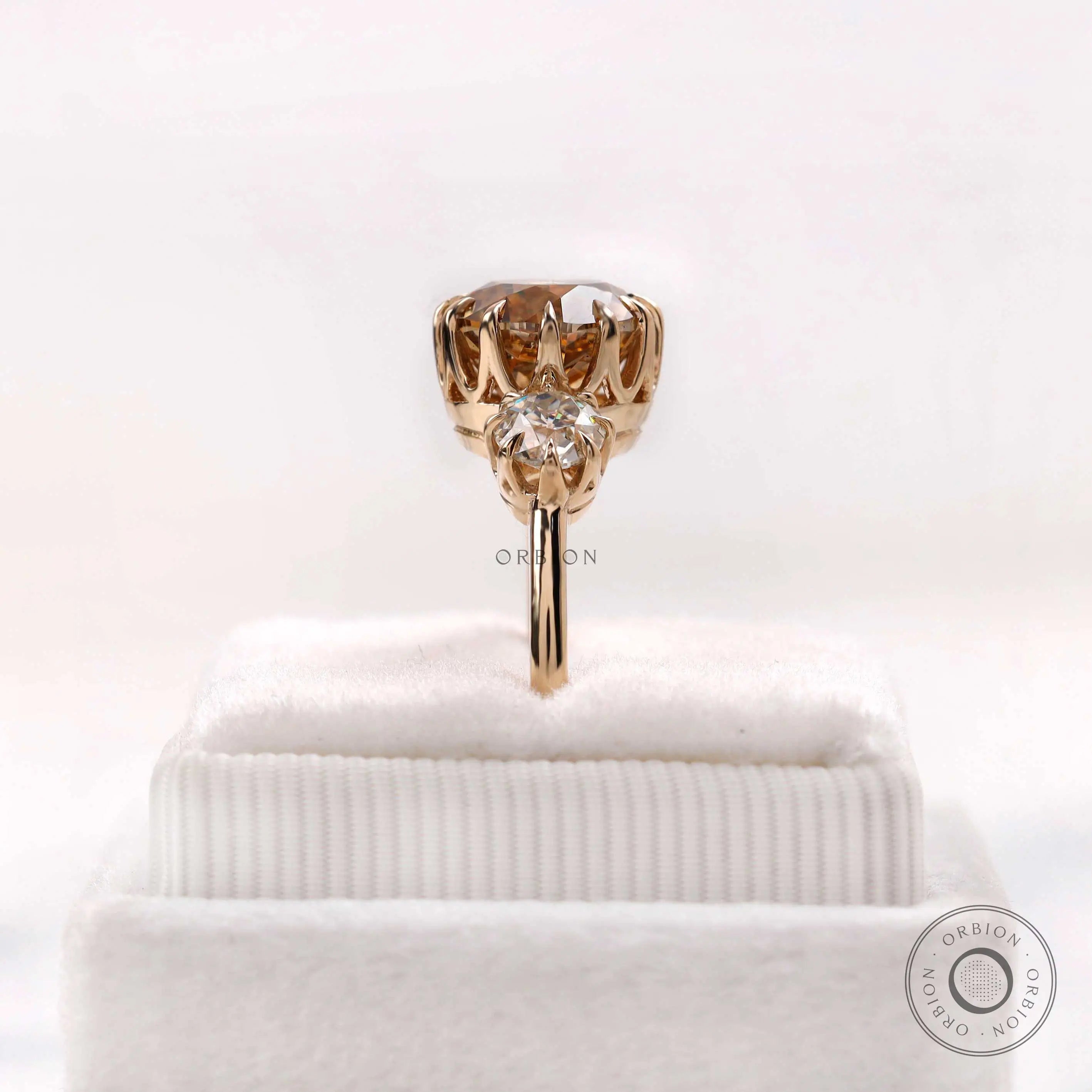 Rear gallery detail of round moissanite three stone ring