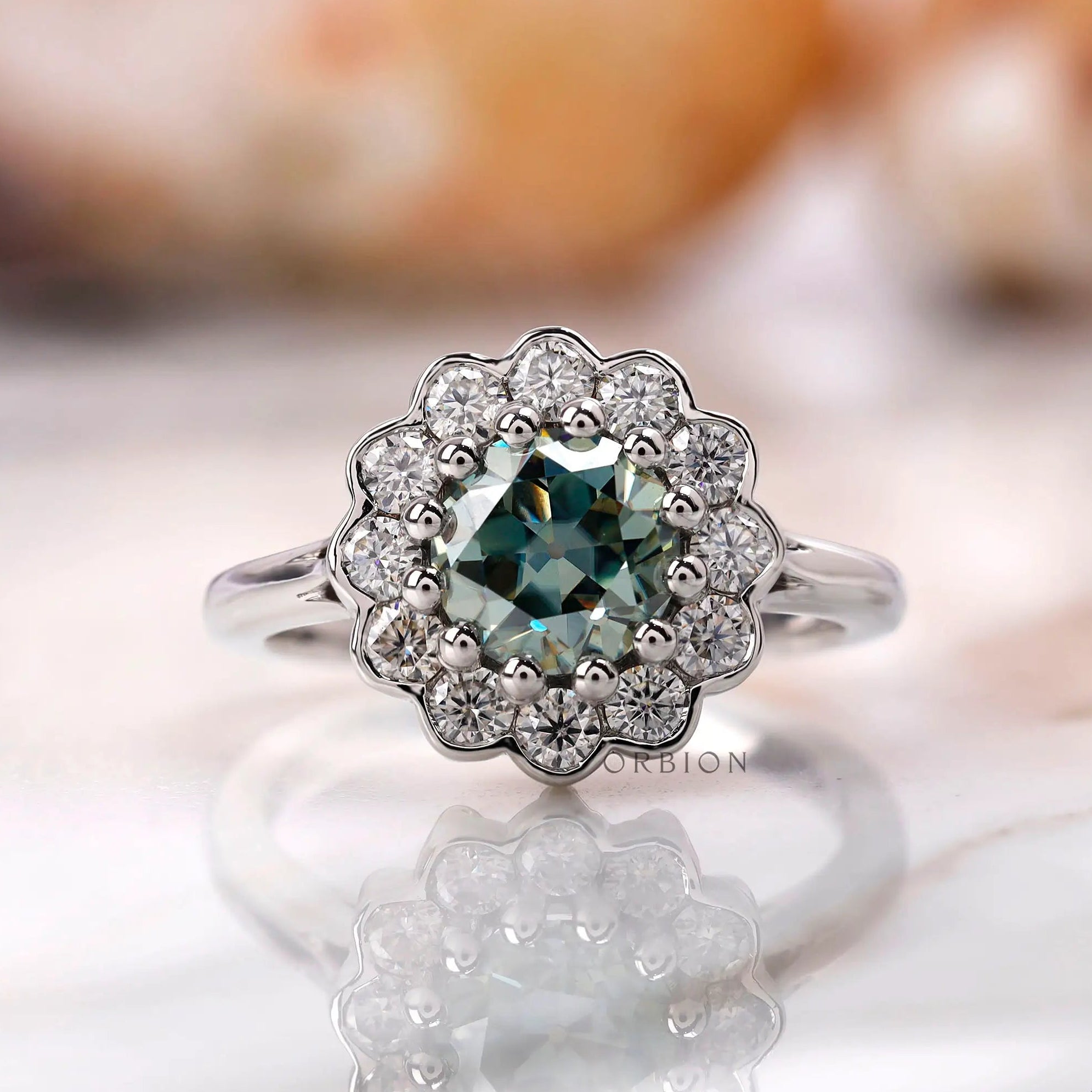 Blue green Old European cut moissanite cluster ring in 10K white gold