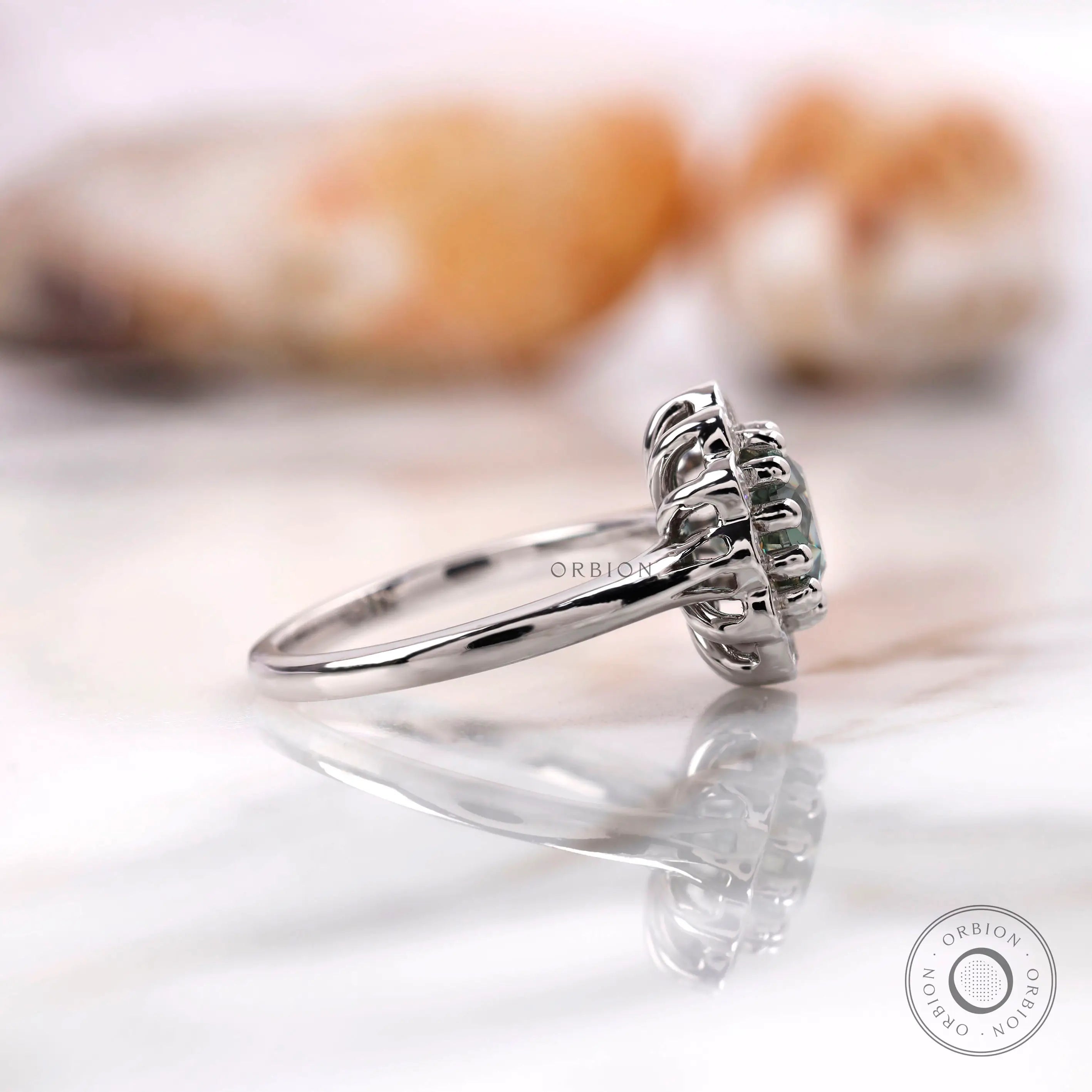 White gold cluster ring side profile view