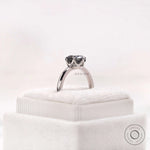 Stone height view emphasizing the Old European cut grey moissanite