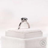 Stone height view emphasizing the Old European cut grey moissanite