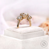 Three stone engagement ring profile view