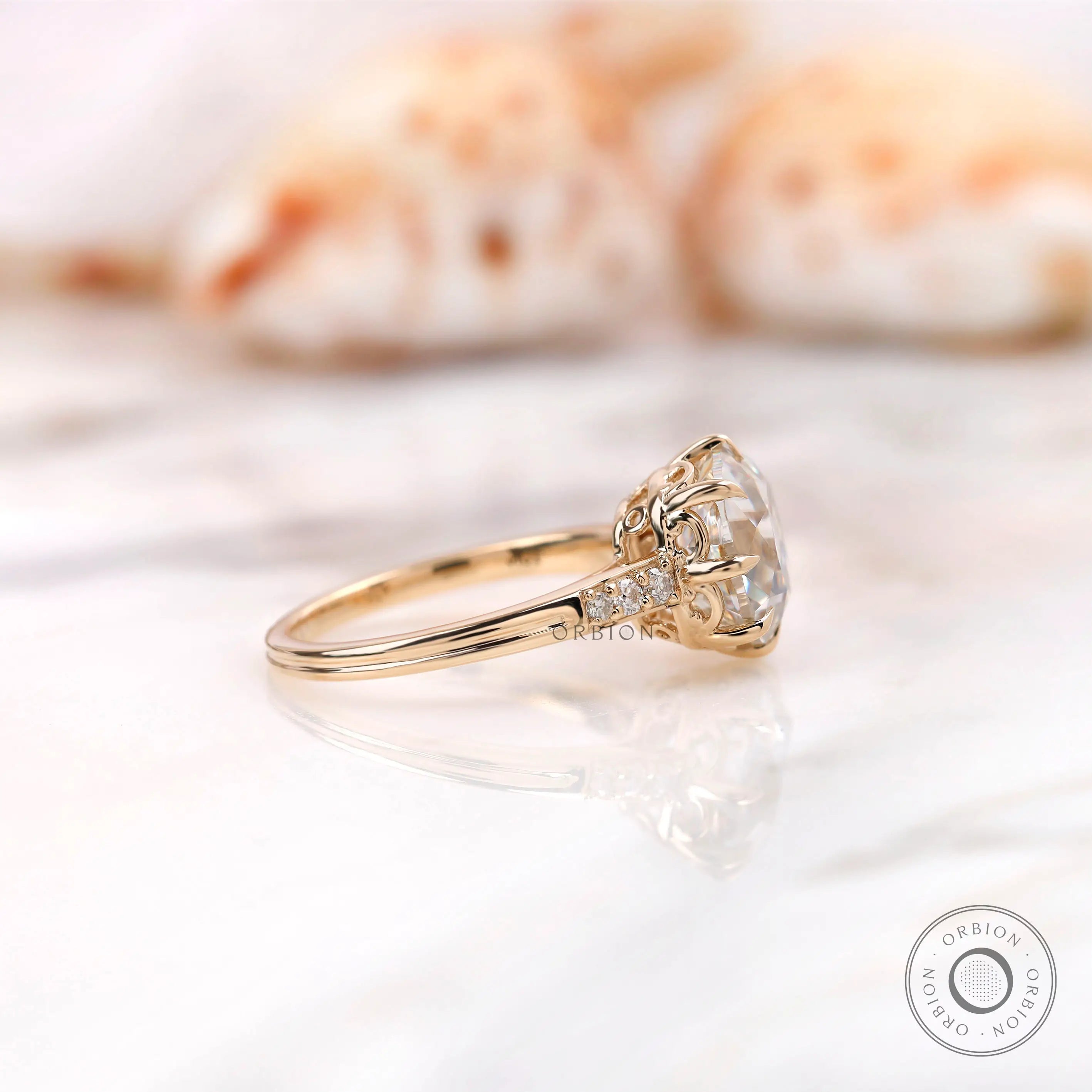 Side profile showing prong setting and accent stones