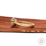 Matte yellow gold band solitaire side profile