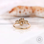 Solid gold three stone ring setting shown from back