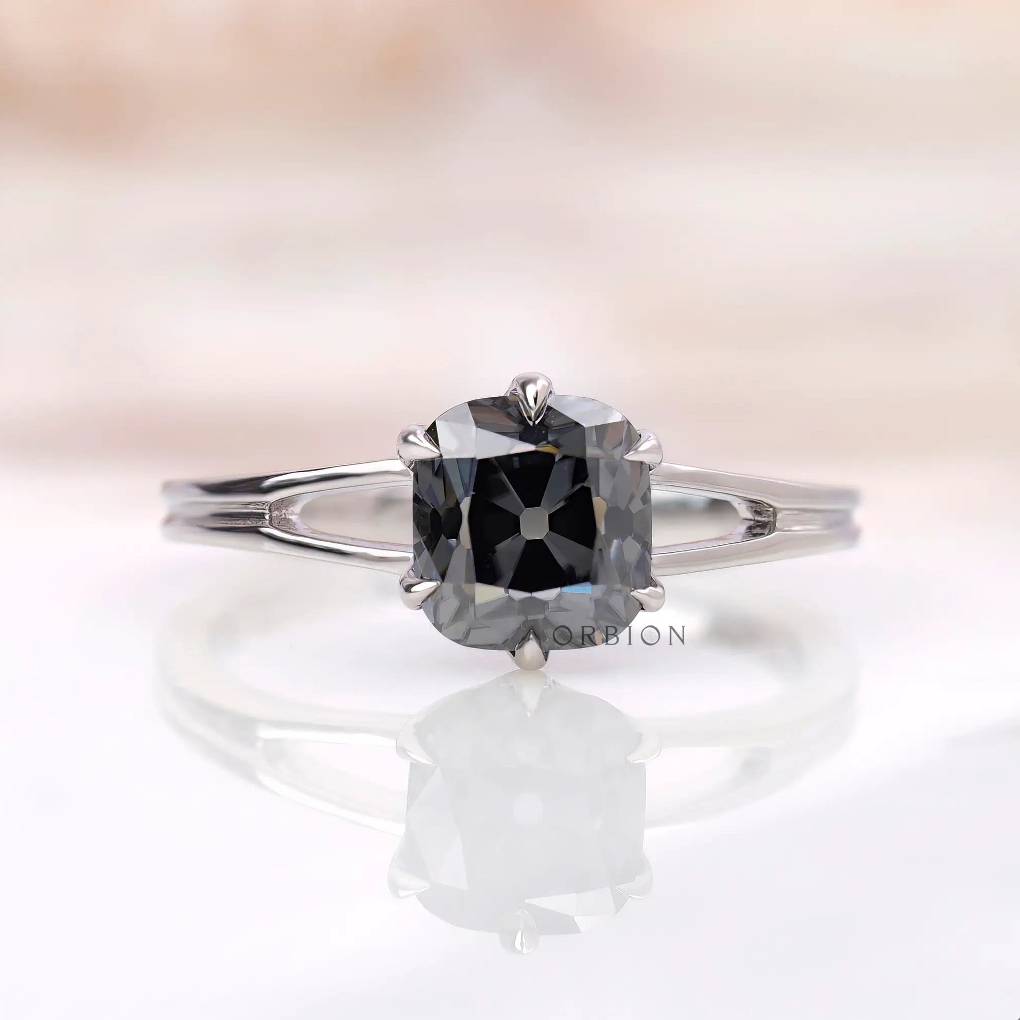 Grey old mine cut elongated cushion moissanite split shank ring in 14K white gold