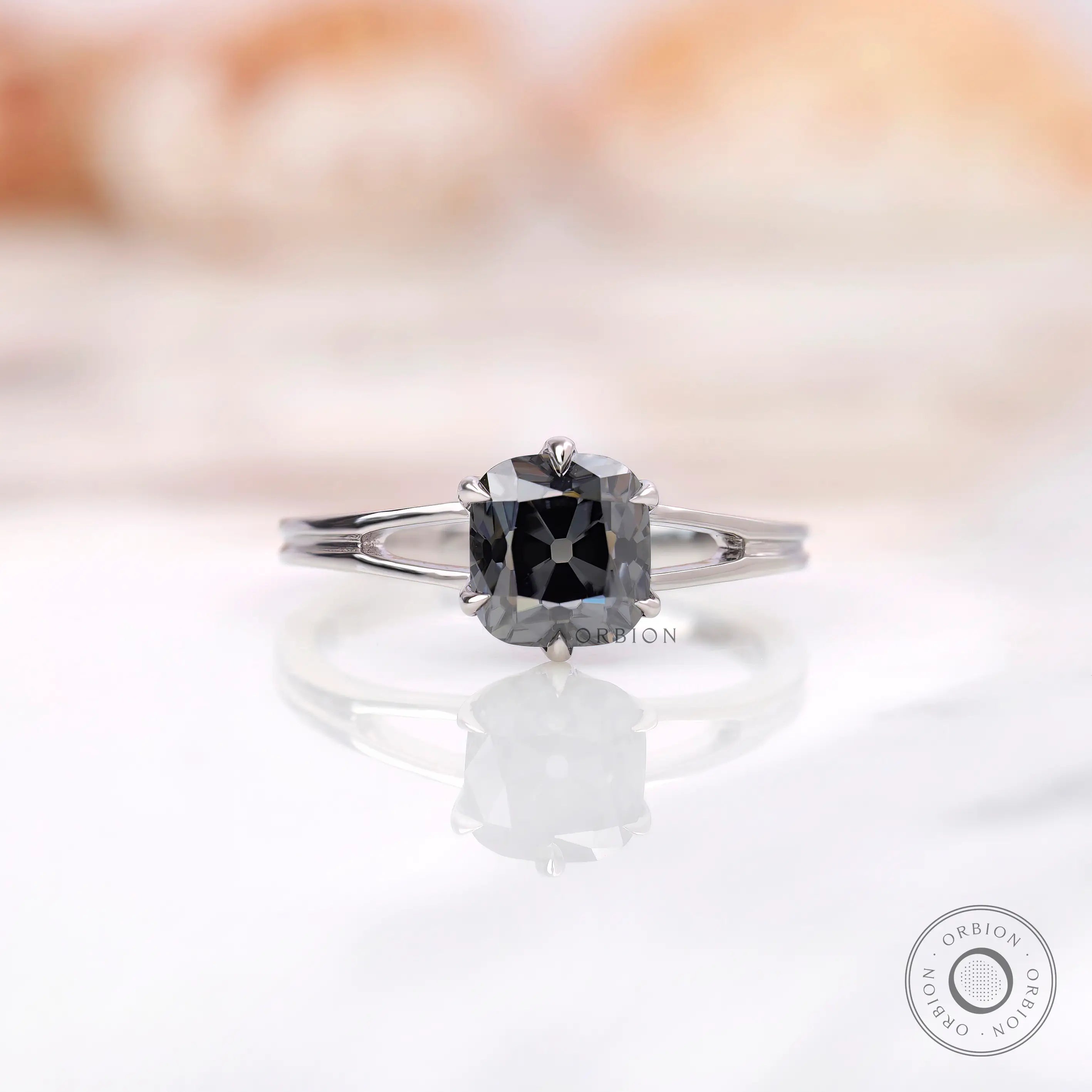Grey old mine cut elongated cushion moissanite split shank ring in 14K white gold