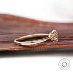 Side view of Champagne Moissanite solitaire ring showing delicate band