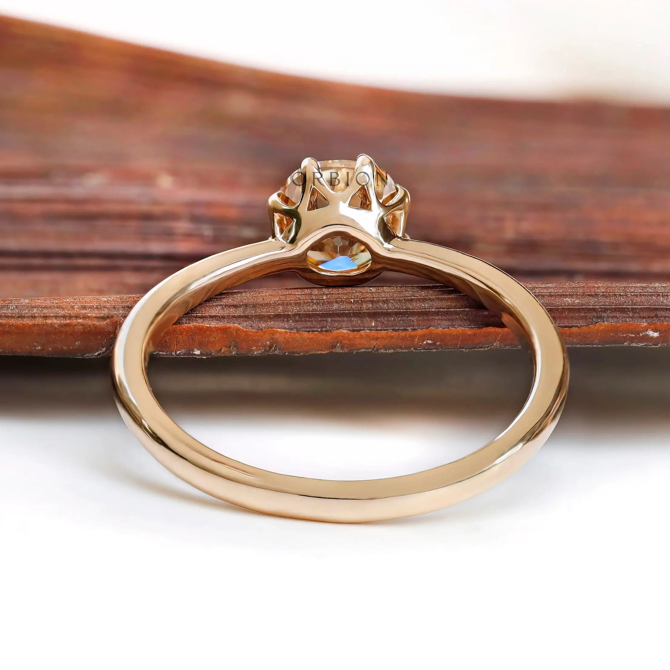 Rear view of Champagne Moissanite solitaire ring in 10K Yellow Gold