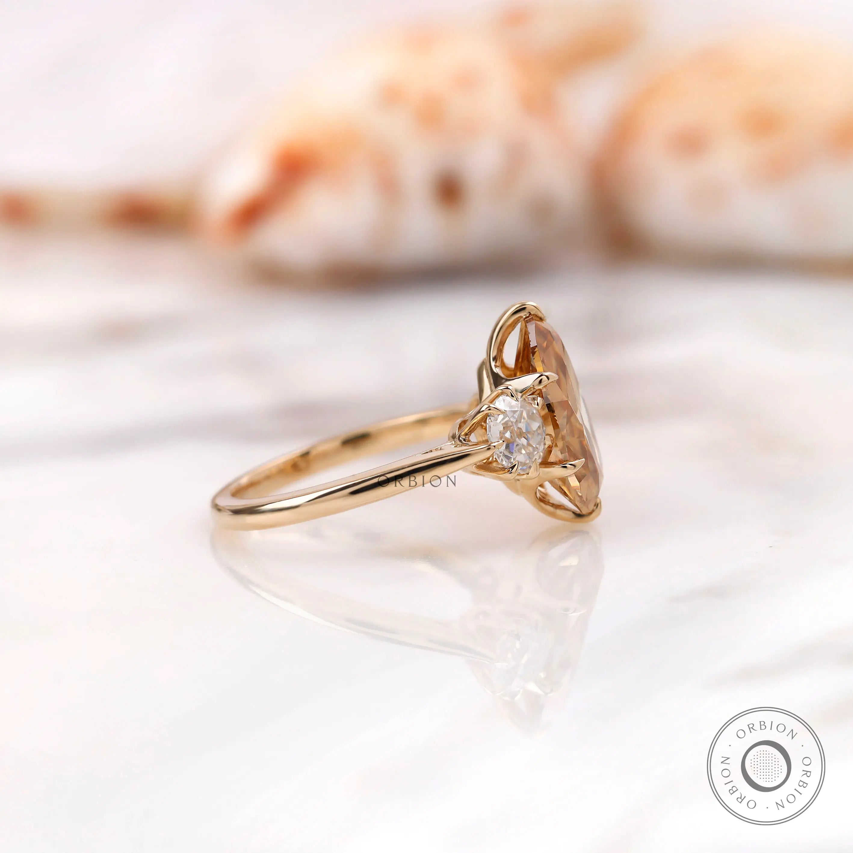 Georgian inspired pear champagne moissanite ring side view