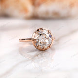 Angled top view showing prong-set moissanite solitaire ring