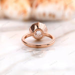 Rear gallery view of solitaire ring with open basket design