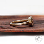 Side view pear moissanite ring with prong setting