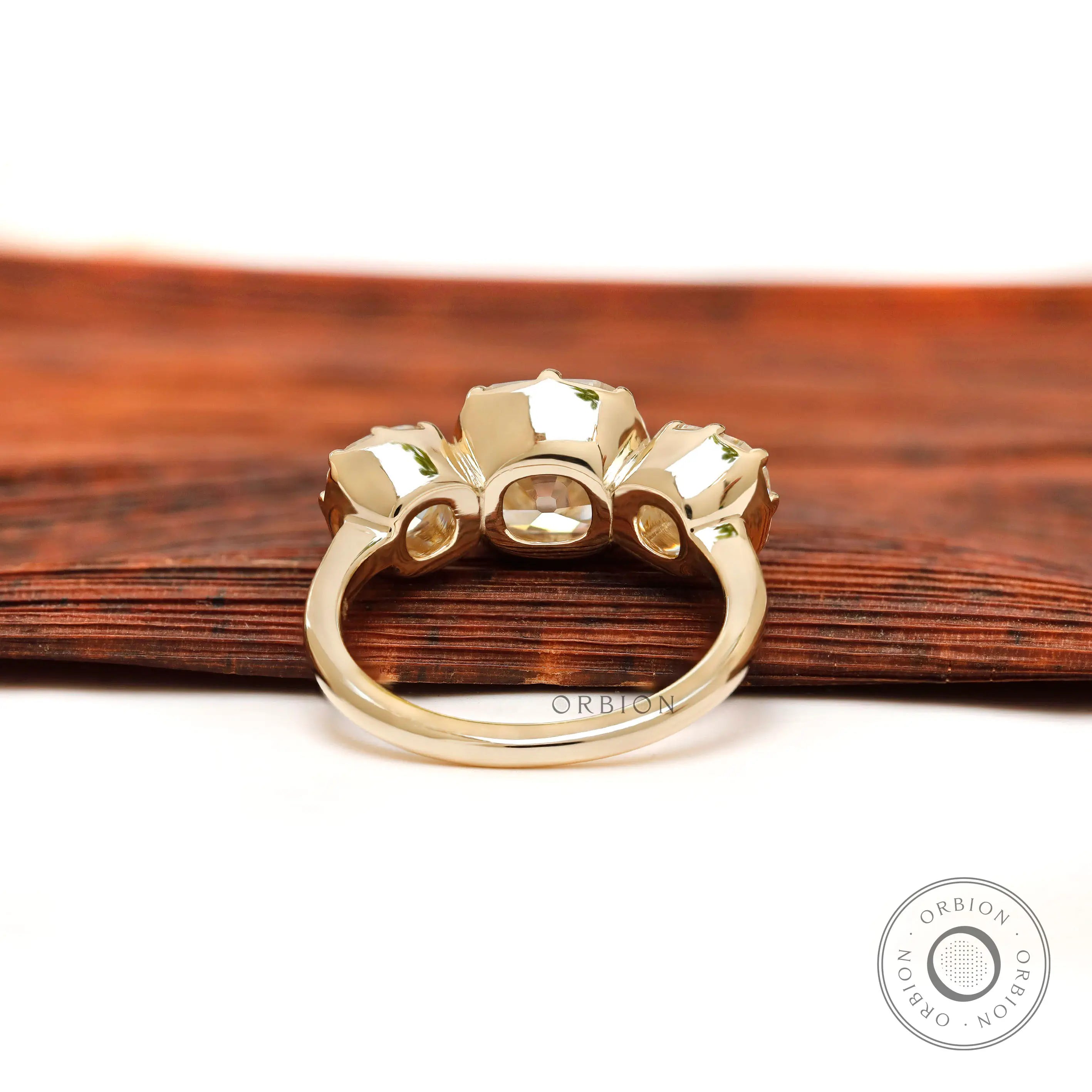 Underside gallery view of three stone moissanite ring