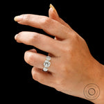 Vintage inspired three stone engagement ring in yellow gold