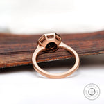 Under-gallery view of halo moissanite ring showing setting details
