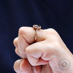 Rear view of rose gold halo ring with tapered band