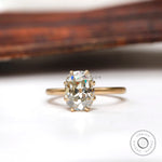 Elongated cushion Old Mine Cut moissanite solitaire ring in yellow gold front view