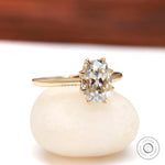 Cushion moissanite solitaire engagement ring high polish yellow gold