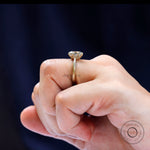 On-hand view of elongated cushion Old Mine Cut moissanite ring