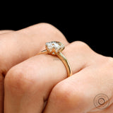Elongated cushion solitaire ring finger coverage view