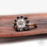 Angled view of halo ring with Old European cut center stone