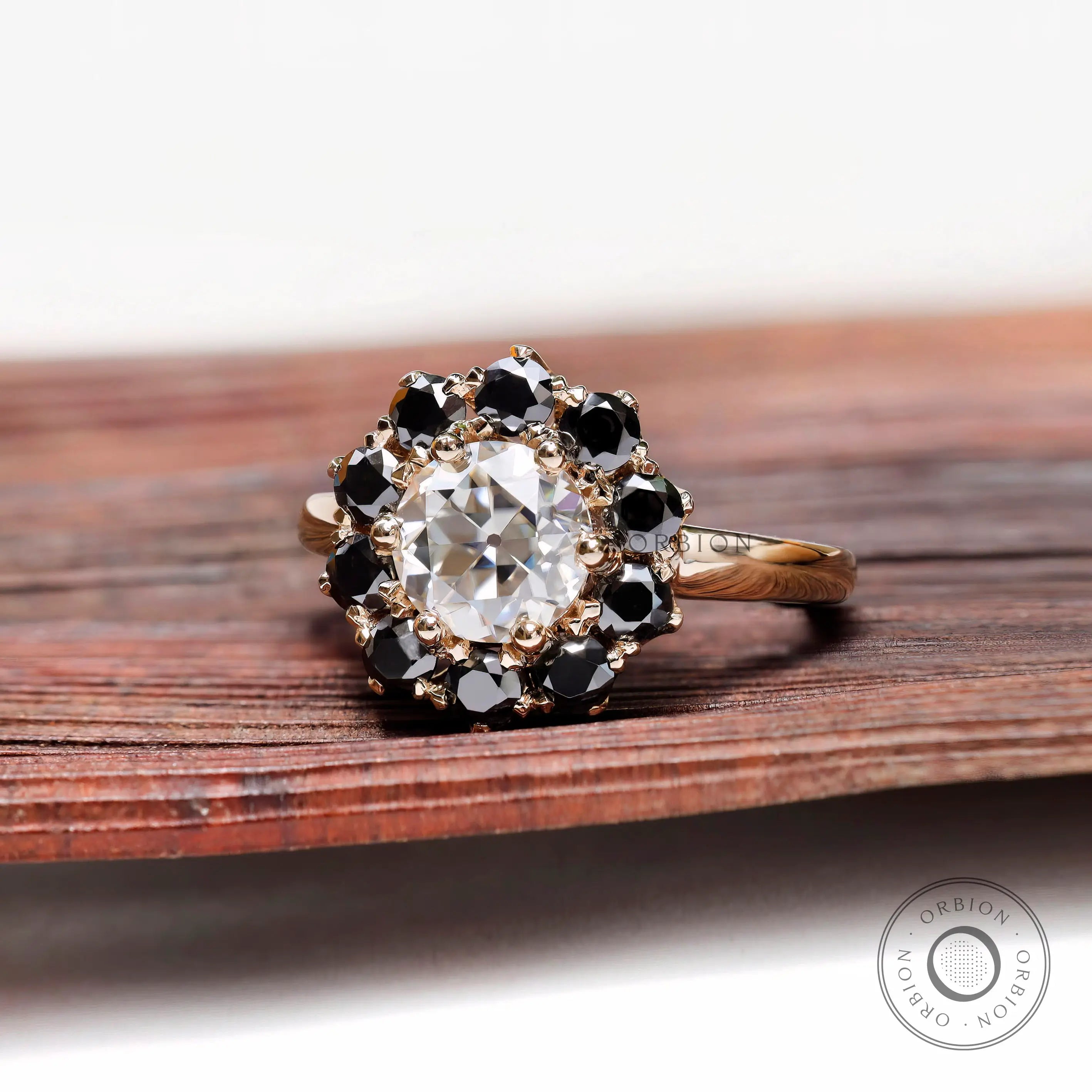 Angled view of halo ring with Old European cut center stone