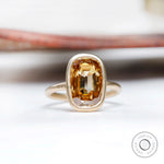 Elongated cushion champagne moissanite bezel set ring in 14K yellow gold