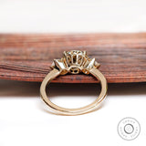 Underside gallery view of three stone moissanite ring