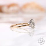 Side profile view of six prong solitaire OEC Moissanite engagement ring.
