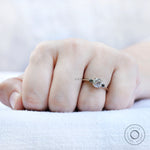 Classic moissanite engagement ring with black stones