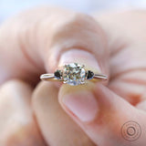 Vintage style moissanite engagement ring close up