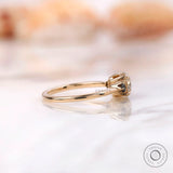 Yellow gold engagement ring with black moissanite accents 