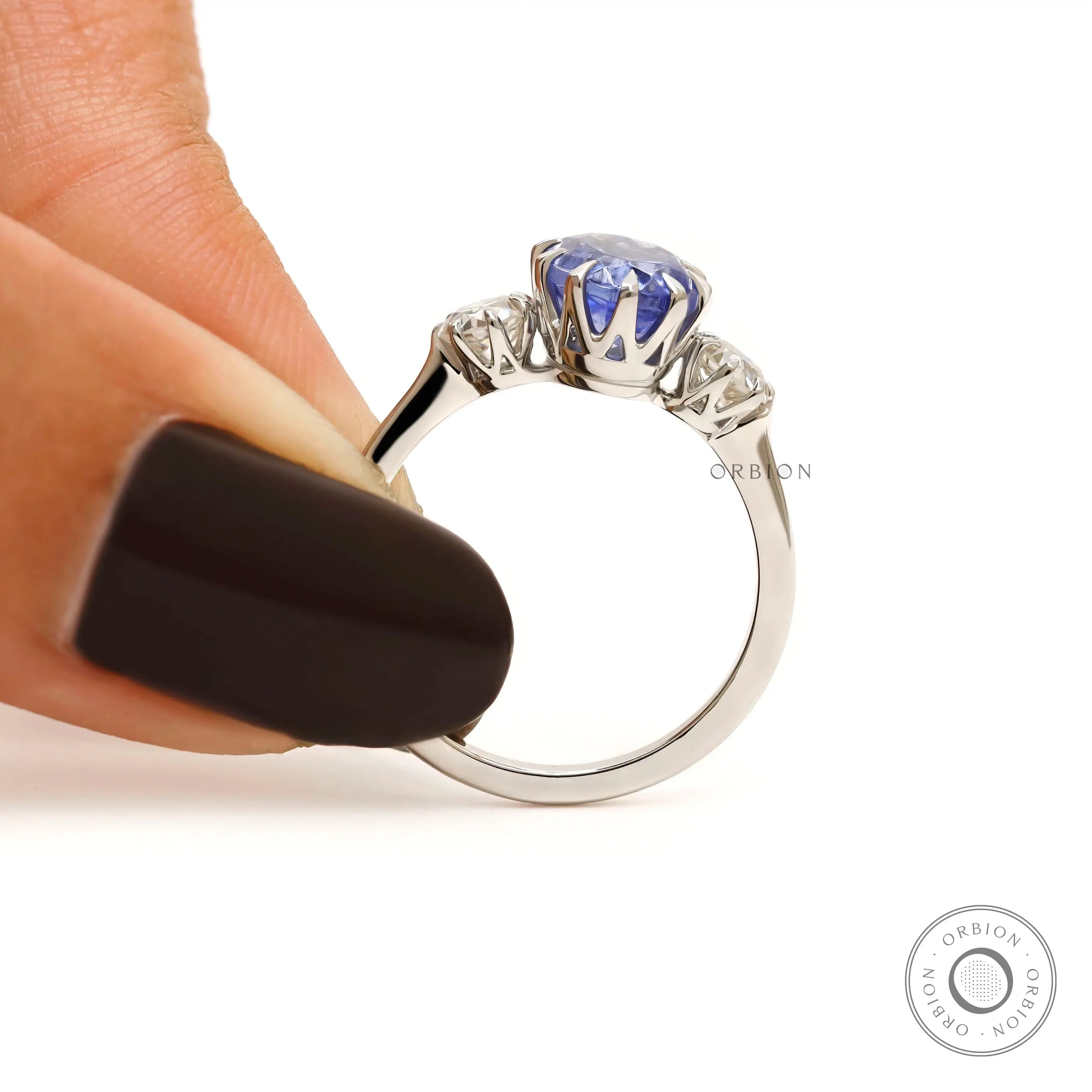 Antique inspired sapphire and diamond engagement ring