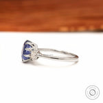 Old European cut diamond side stones on sapphire engagement ring