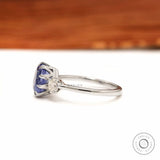 Old European cut diamond side stones on sapphire engagement ring