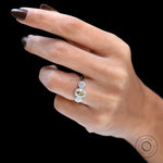 Three stone vintage style engagement ring white gold on fingure