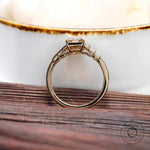 Minimalist emerald cut champagne moissanite ring with step cut baguette accents