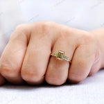 Elegant champagne moissanite 3 stone engagement ring worn on hand