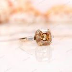 Angled view of Asscher moissanite ring with baguette side stones