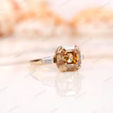 Angled view of Asscher moissanite ring with baguette side stones