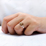 Hand worn champagne moissanite ring front view