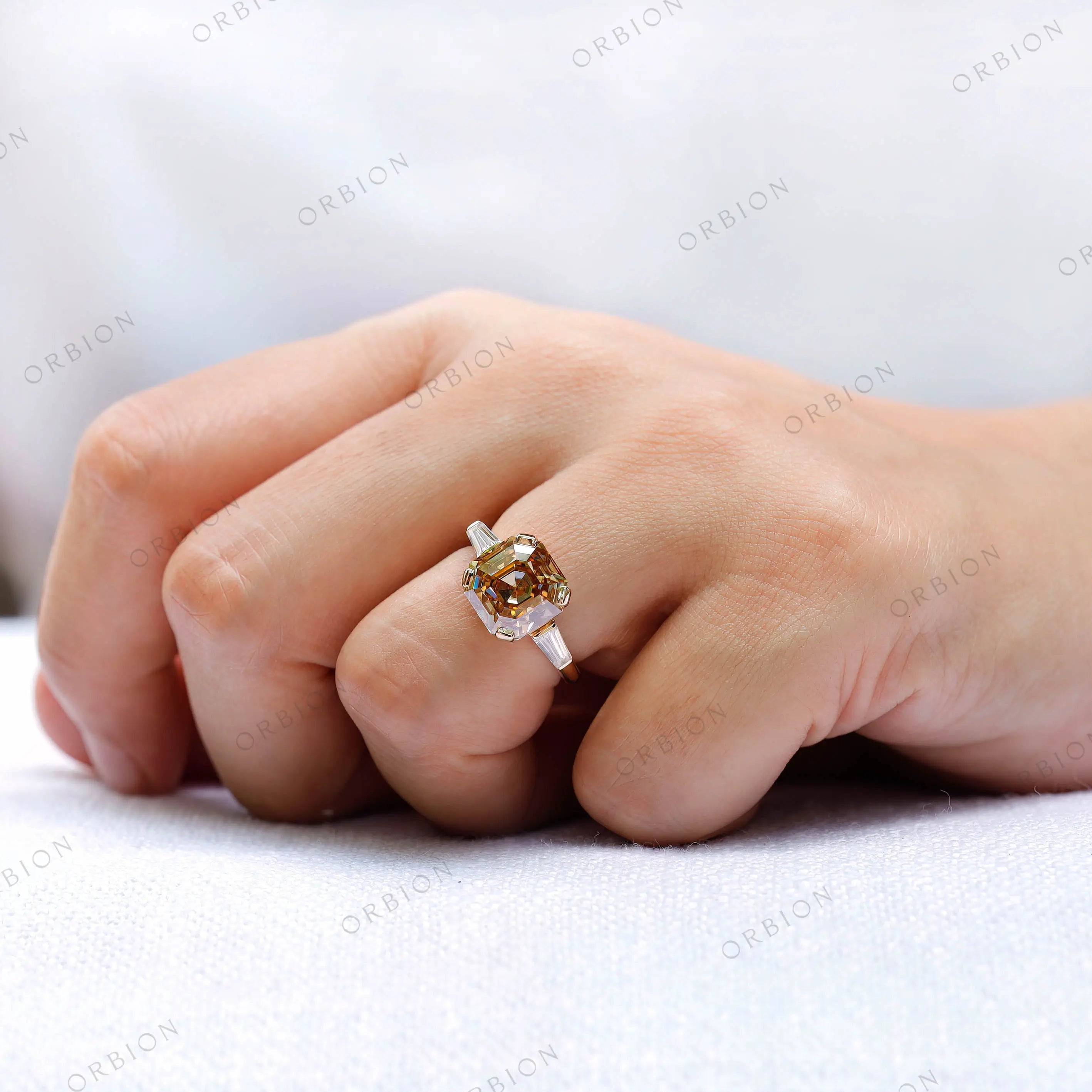 Hand worn champagne moissanite ring front view