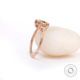 Top view of OEC Champagne Moissanite ring with baguette accents