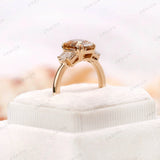 Champagne moissanite engagement ring displayed in a ring box