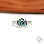 Front view of hexagon blue-green moissanite solitaire ring