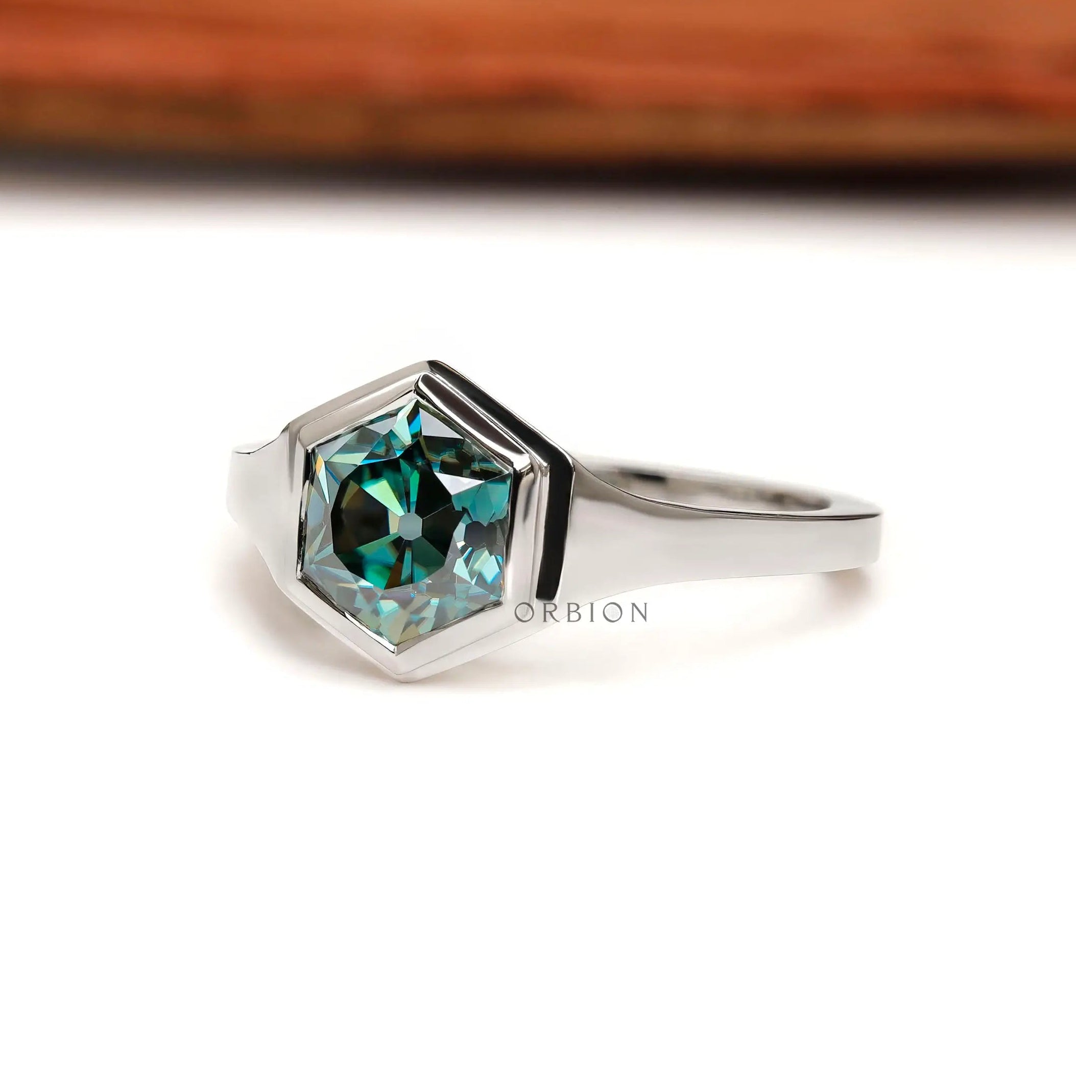 Angled view highlighting hexagon Old Mine Cut moissanite